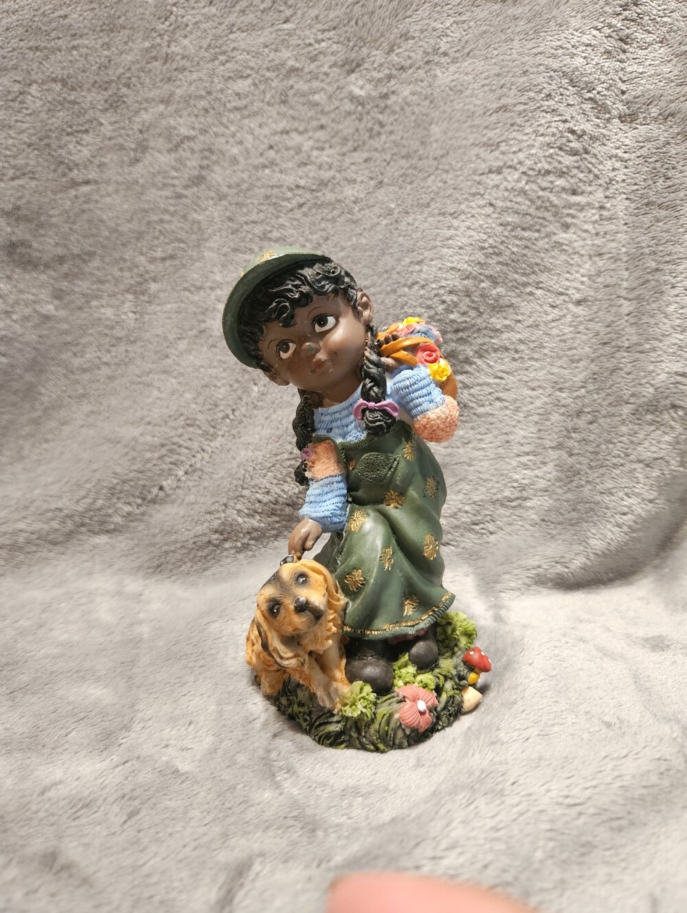 African American girl and her dog, yard decor. Resin
